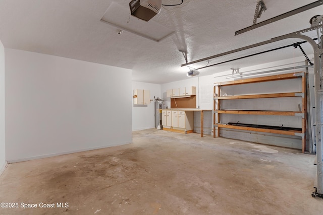 47 Anchor Dr, Indian Harbour Beach, FL 32937 - garage featuring a garage door opener and water heater