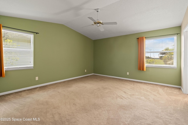 47 Anchor Dr, Indian Harbour Beach, FL 32937 - unfurnished room featuring carpet floors, lofted ceiling, and a ceiling fan
