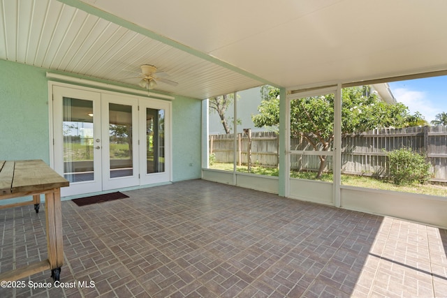 47 Anchor Dr, Indian Harbour Beach, FL 32937 - unfurnished sunroom with french doors and ceiling fan