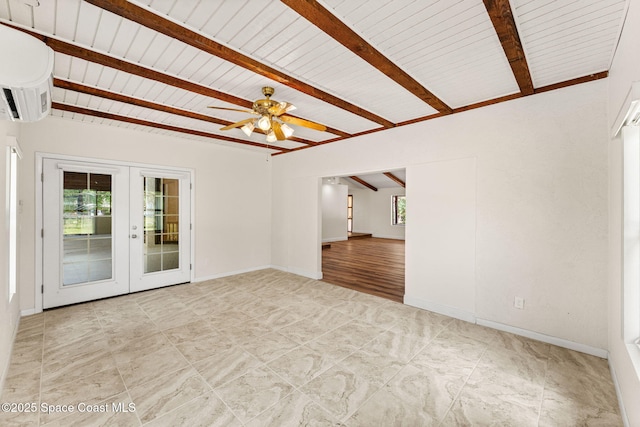 2150 Winston Dr, Cocoa, FL 32926 - unfurnished room featuring french doors, beamed ceiling, a wall unit AC, and a ceiling fan