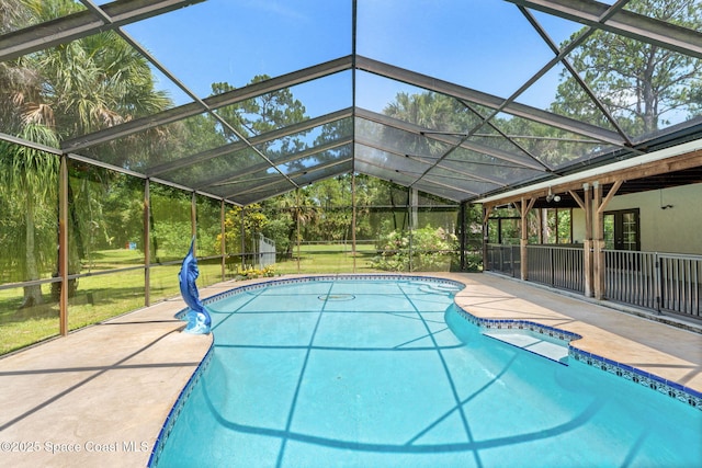 2150 Winston Dr, Cocoa, FL 32926 - outdoor pool with a patio, a lawn, and glass enclosure