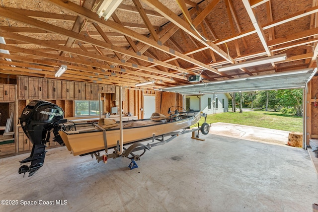 2150 Winston Dr, Cocoa, FL 32926 - garage featuring a garage door opener