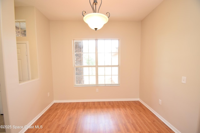 741 Pebble Ave NE, Palm Bay, FL 32907 - empty room with light wood finished floors and baseboards