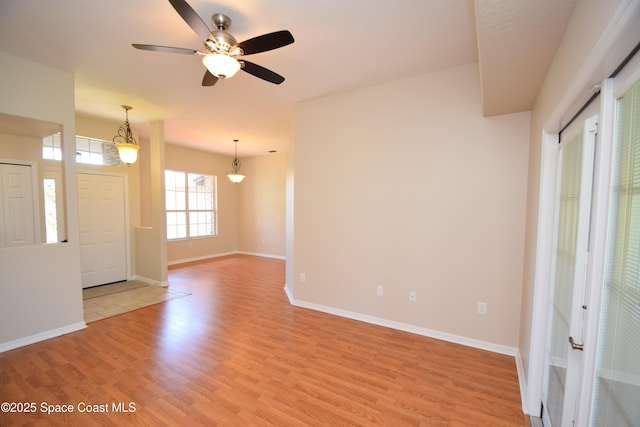 741 Pebble Ave NE, Palm Bay, FL 32907 - entryway featuring light wood-type flooring and ceiling fan