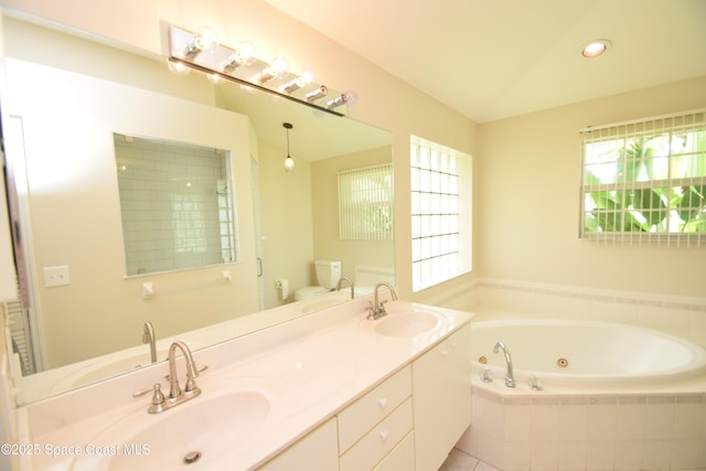 741 Pebble Ave NE, Palm Bay, FL 32907 - full bath featuring a tub with jets and double vanity