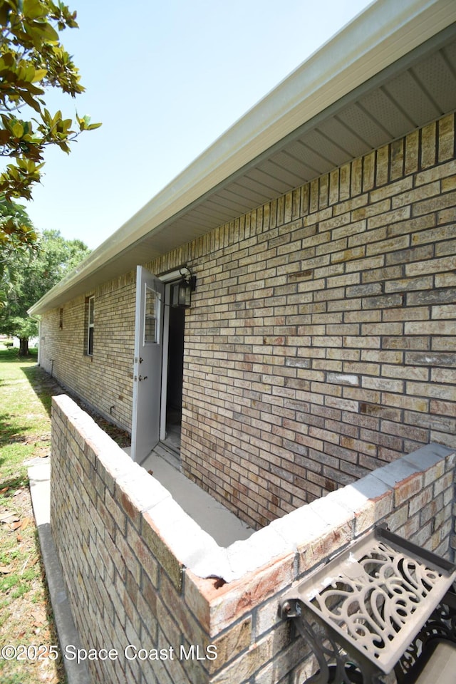 741 Pebble Ave NE, Palm Bay, FL 32907 - property entrance featuring brick siding