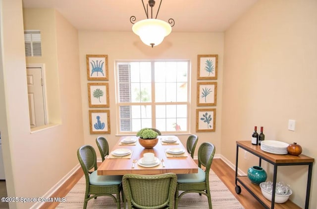 741 Pebble Ave NE, Palm Bay, FL 32907 - dining room featuring wood finished floors