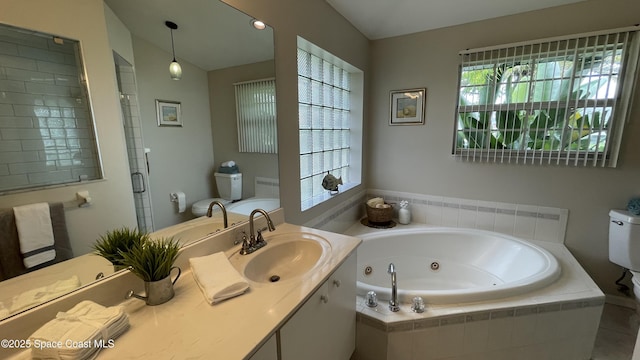 741 Pebble Ave NE, Palm Bay, FL 32907 - bathroom with a whirlpool tub, vanity, and a stall shower