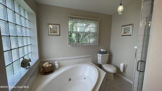 741 Pebble Ave NE, Palm Bay, FL 32907 - full bath featuring a whirlpool tub, tile patterned flooring, and a shower with shower door