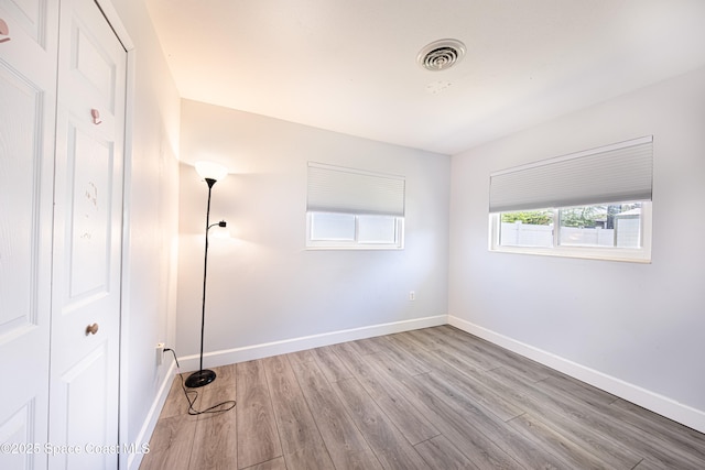 1384 Rosemary Dr, Melbourne, FL 32935 - unfurnished bedroom featuring wood finished floors