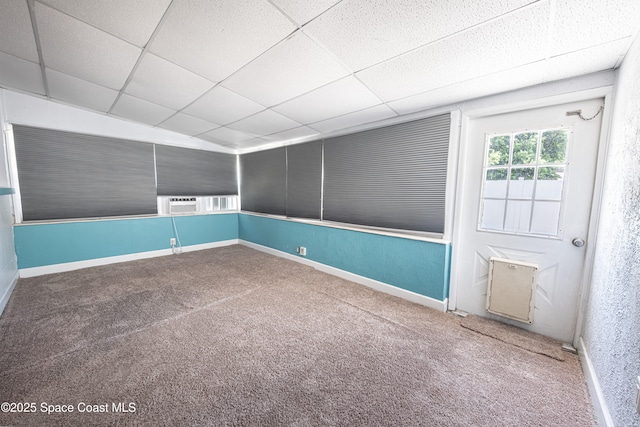 1384 Rosemary Dr, Melbourne, FL 32935 - carpeted spare room featuring a drop ceiling and baseboards