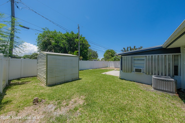 1384 Rosemary Dr, Melbourne, FL 32935 - fenced backyard featuring a storage shed and cooling unit