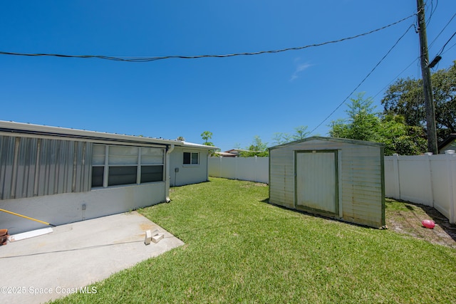 1384 Rosemary Dr, Melbourne, FL 32935 - fenced backyard with a shed and a patio area