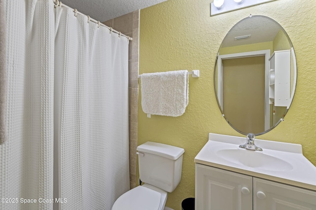 605 Ocean Park Ln Unit V235, Cape Canaveral, FL 32920 - full bath with a textured wall, vanity, a textured ceiling, and curtained shower