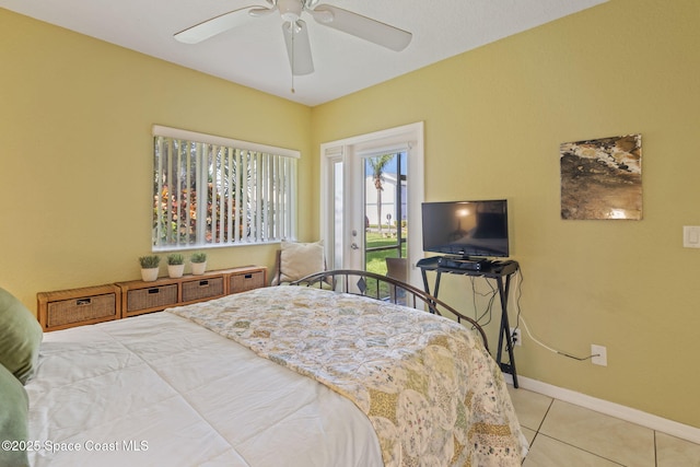 605 Ocean Park Ln Unit V235, Cape Canaveral, FL 32920 - tiled bedroom featuring access to exterior and a ceiling fan