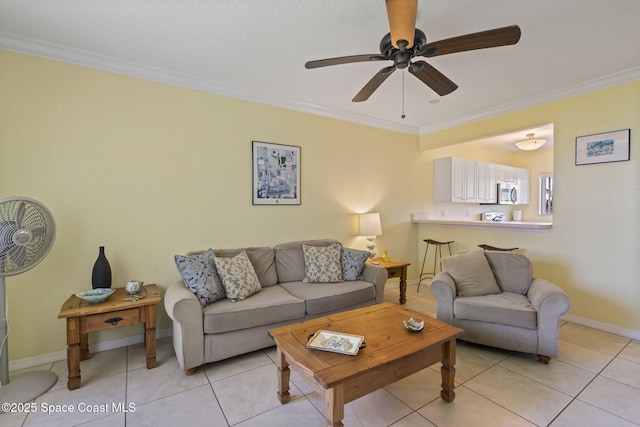 605 Ocean Park Ln Unit V235, Cape Canaveral, FL 32920 - living room featuring ornamental molding, a ceiling fan, and light tile patterned floors
