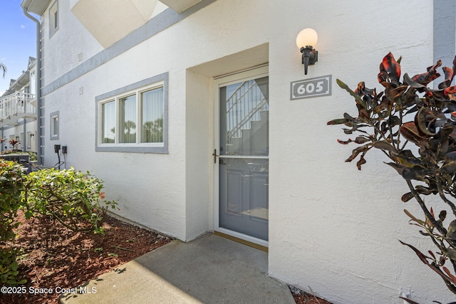 605 Ocean Park Ln Unit V235, Cape Canaveral, FL 32920 - property entrance featuring stucco siding