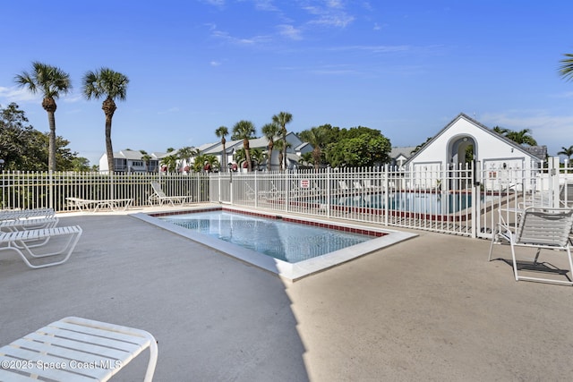 605 Ocean Park Ln Unit V235, Cape Canaveral, FL 32920 - community pool featuring a patio area