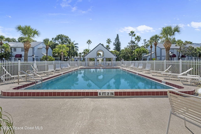 605 Ocean Park Ln Unit V235, Cape Canaveral, FL 32920 - community pool with a patio area and a residential view