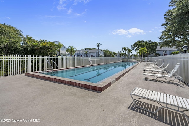 605 Ocean Park Ln Unit V235, Cape Canaveral, FL 32920 - community pool with a patio area