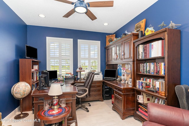 9124 Corvo Ct, Melbourne, FL 32940 - home office with ceiling fan, light wood-style flooring, and recessed lighting