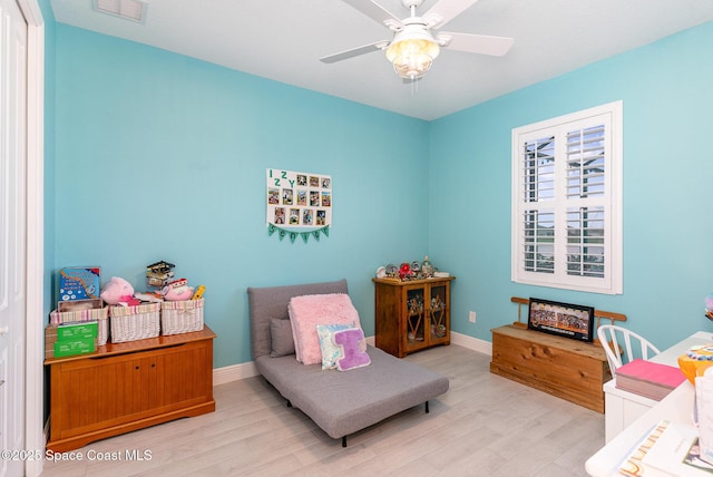 9124 Corvo Ct, Melbourne, FL 32940 - bedroom featuring wood finished floors, a ceiling fan, and a closet