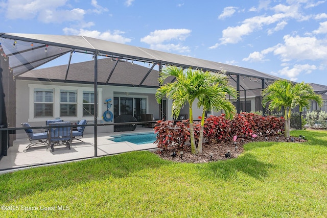 9124 Corvo Ct, Melbourne, FL 32940 - back of property featuring a patio area, a lawn, stucco siding, an outdoor pool, and a lanai