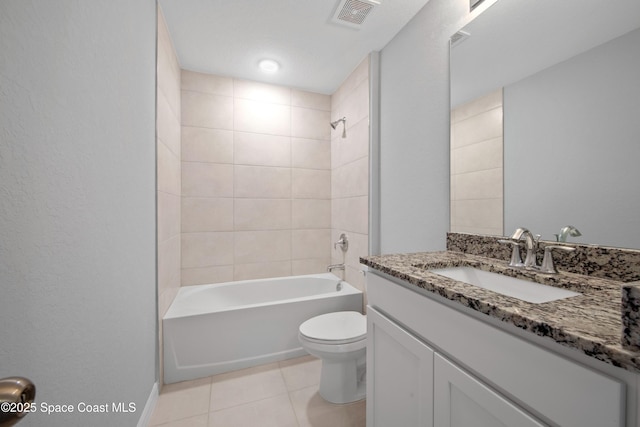1011 Eldron Blvd SE, Palm Bay, FL 32909 - bathroom featuring vanity, tile patterned floors, and bathing tub / shower combination