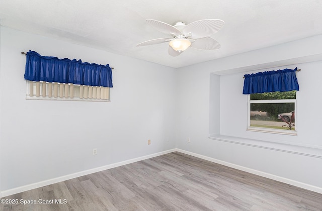 1661 Sandusky St SE, Palm Bay, FL 32909 - unfurnished room with wood finished floors and ceiling fan
