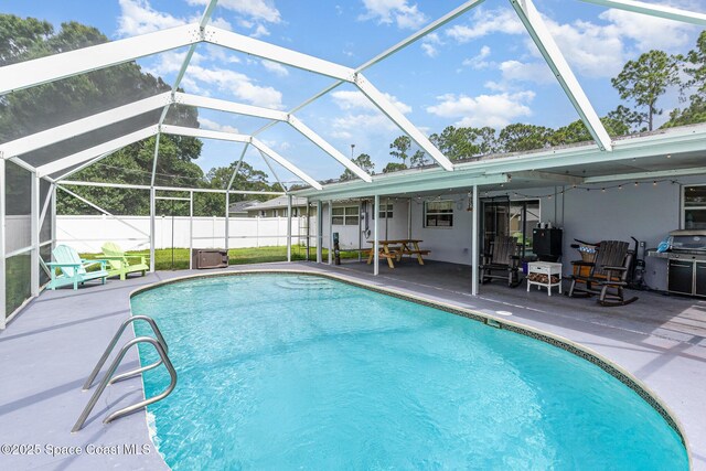 1661 Sandusky St SE, Palm Bay, FL 32909 - view of pool with a patio and glass enclosure