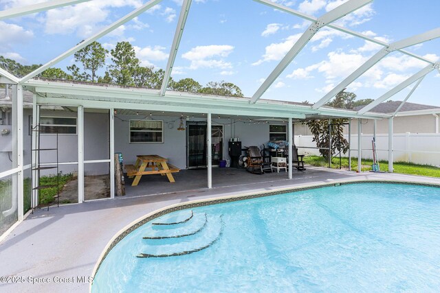 1661 Sandusky St SE, Palm Bay, FL 32909 - view of pool featuring a patio area and a lanai