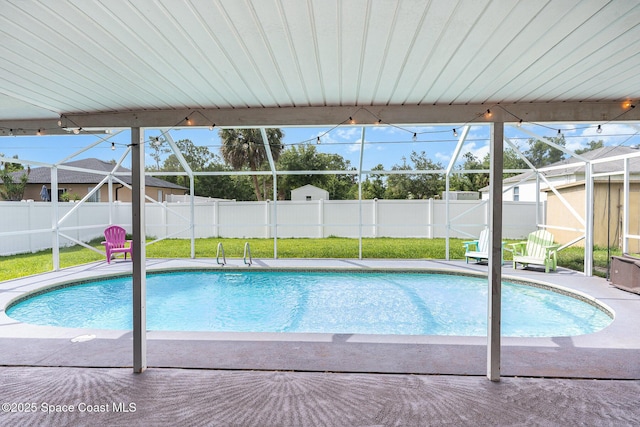 1661 Sandusky St SE, Palm Bay, FL 32909 - view of swimming pool with a fenced backyard, a lanai, and a patio