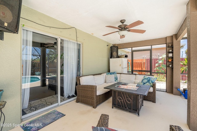 713 Del Mar Cir, Melbourne, FL 32904 - view of patio / terrace featuring a ceiling fan and an outdoor living space with a fire pit