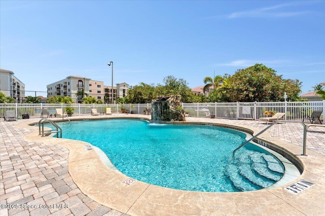 121 Lancha Cir Unit 203, Indian Harbour Beach, FL 32937 - community pool featuring a patio