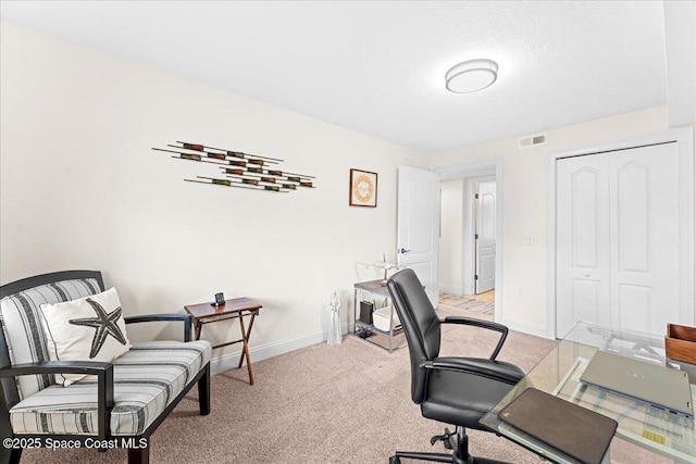 121 Lancha Cir Unit 203, Indian Harbour Beach, FL 32937 - office area with light colored carpet and a textured ceiling