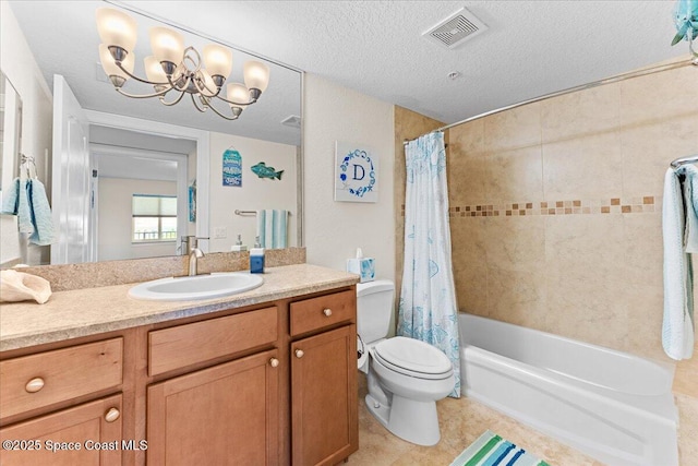 121 Lancha Cir Unit 203, Indian Harbour Beach, FL 32937 - bathroom featuring vanity, shower / bath combination with curtain, a textured ceiling, a chandelier, and tile patterned flooring