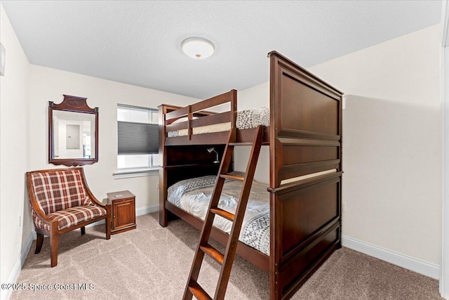 121 Lancha Cir Unit 203, Indian Harbour Beach, FL 32937 - bedroom featuring light carpet and baseboards