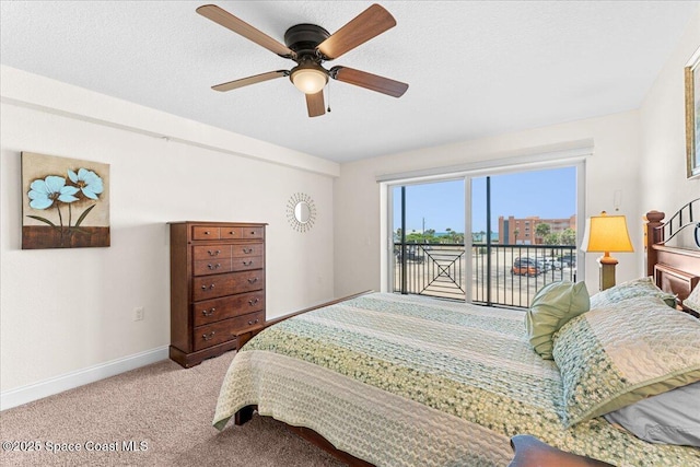 121 Lancha Cir Unit 203, Indian Harbour Beach, FL 32937 - carpeted bedroom featuring access to exterior and ceiling fan