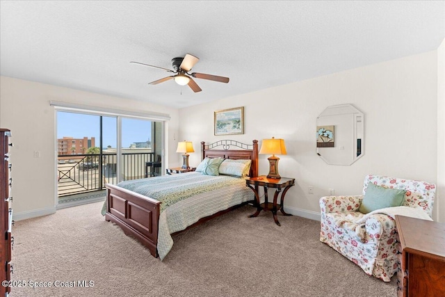 121 Lancha Cir Unit 203, Indian Harbour Beach, FL 32937 - bedroom featuring access to exterior, carpet floors, and a ceiling fan
