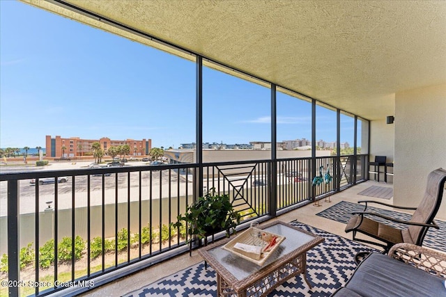 121 Lancha Cir Unit 203, Indian Harbour Beach, FL 32937 - view of sunroom / solarium
