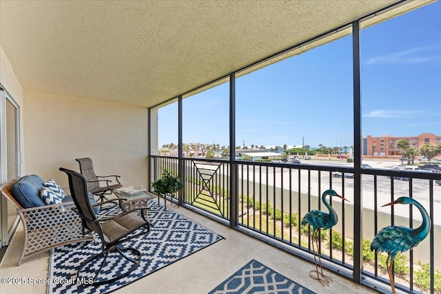 121 Lancha Cir Unit 203, Indian Harbour Beach, FL 32937 - sunroom / solarium with plenty of natural light