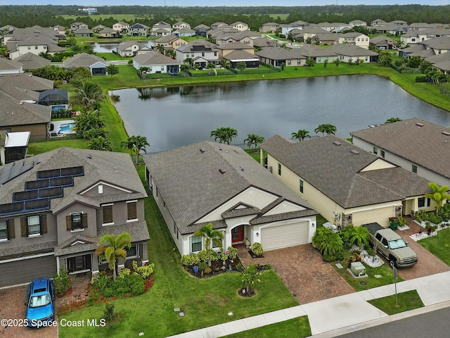 4729 Alligator Flag Cir, West Melbourne, FL 32904 - aerial perspective of suburban area with a large body of water