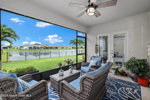 4729 Alligator Flag Cir, West Melbourne, FL 32904 - sunroom with a water view, ceiling fan, outdoor lounge area, and a residential view