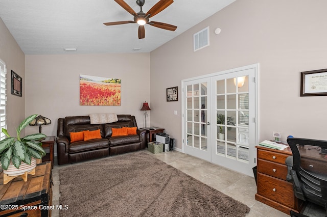 4729 Alligator Flag Cir, West Melbourne, FL 32904 - tiled living room with vaulted ceiling, french doors, ceiling fan, and an office area