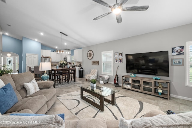 4729 Alligator Flag Cir, West Melbourne, FL 32904 - living area with vaulted ceiling, ceiling fan, and recessed lighting