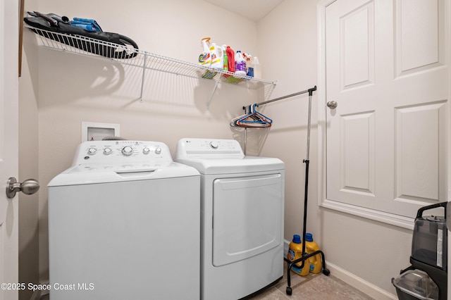 4729 Alligator Flag Cir, West Melbourne, FL 32904 - washroom with washer and dryer and baseboards