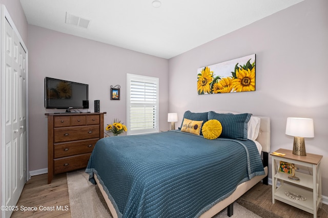 4729 Alligator Flag Cir, West Melbourne, FL 32904 - bedroom with wood finished floors and a closet