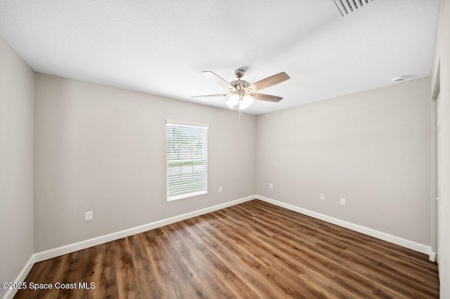 1011 Webster Rd SE, Palm Bay, FL 32909 - unfurnished room featuring wood finished floors and a ceiling fan