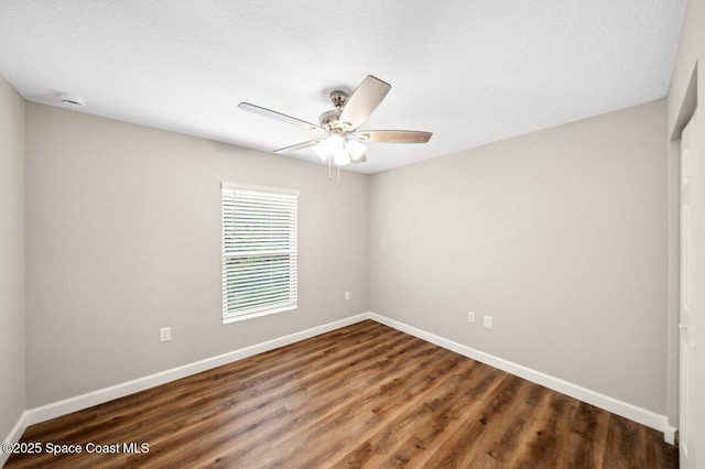 1011 Webster Rd SE, Palm Bay, FL 32909 - spare room with wood finished floors and ceiling fan