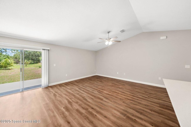 1011 Webster Rd SE, Palm Bay, FL 32909 - empty room featuring ceiling fan, wood finished floors, and vaulted ceiling
